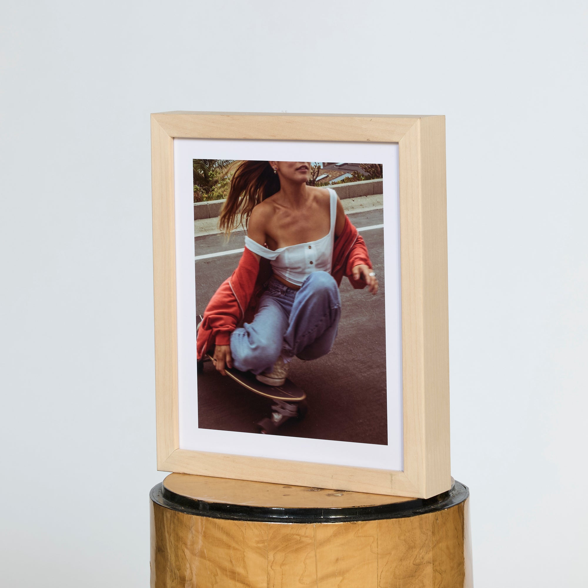 Framed photo of a person skateboarding on a white background