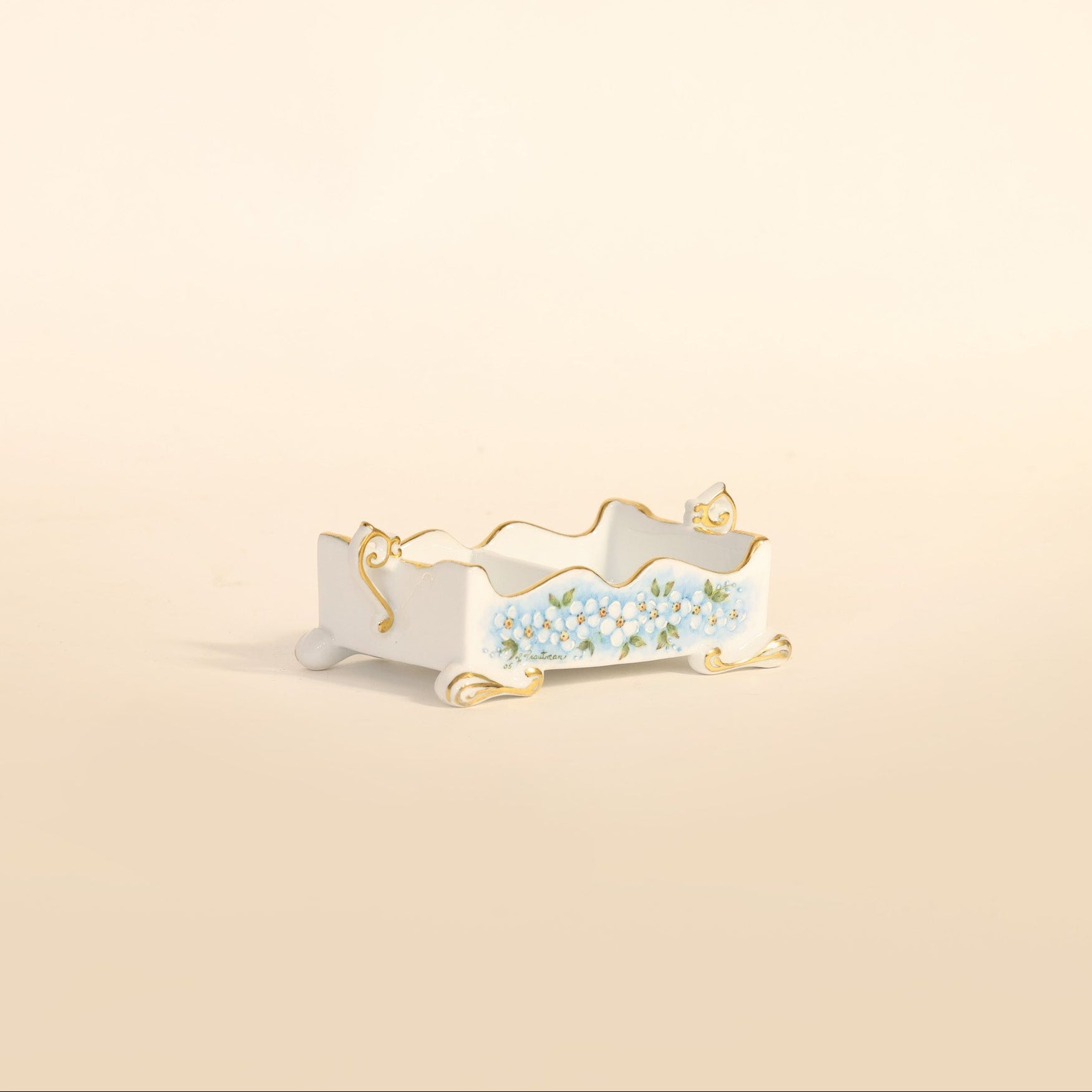 Decorative tray with floral design on a beige background
