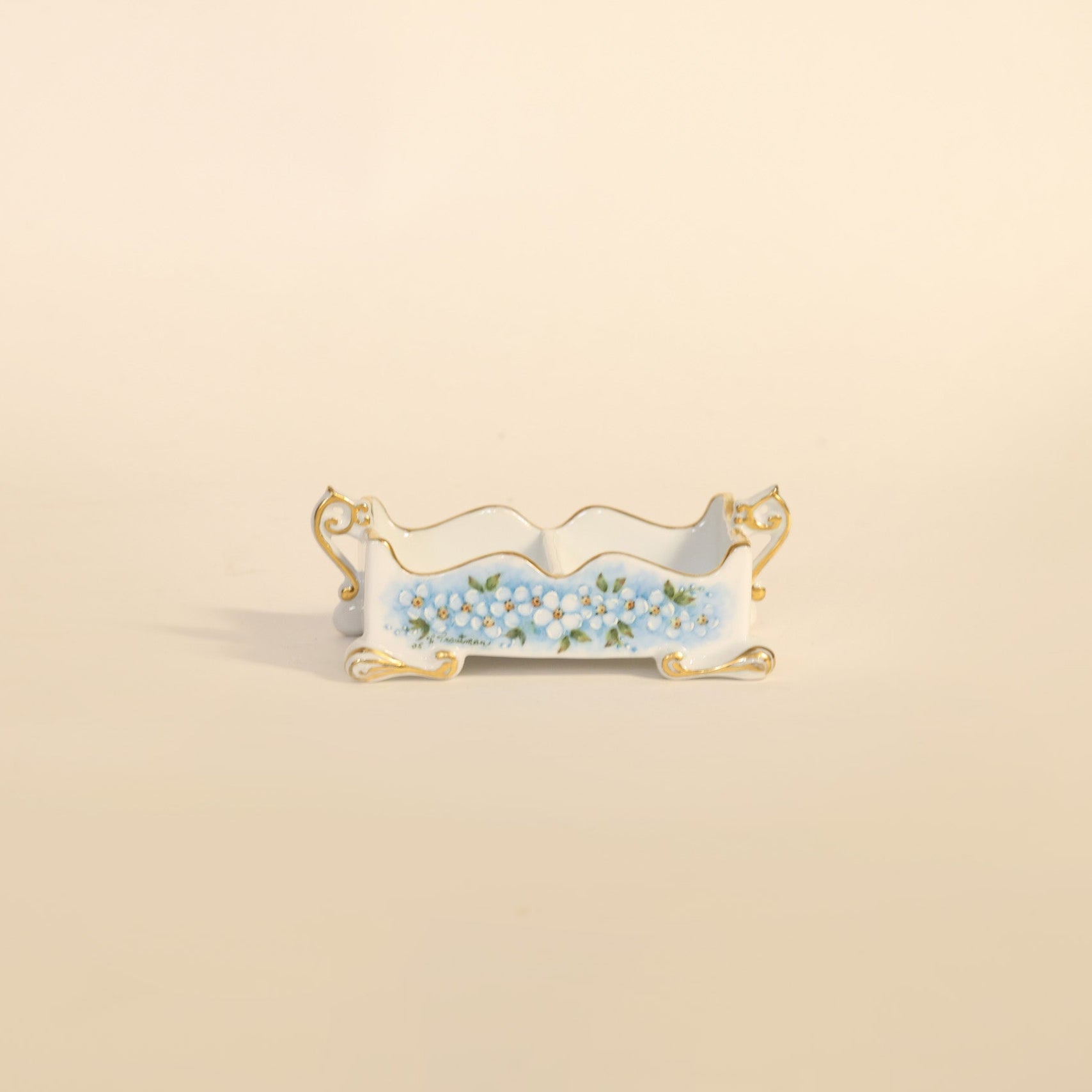 Decorative tray with floral design on a beige background