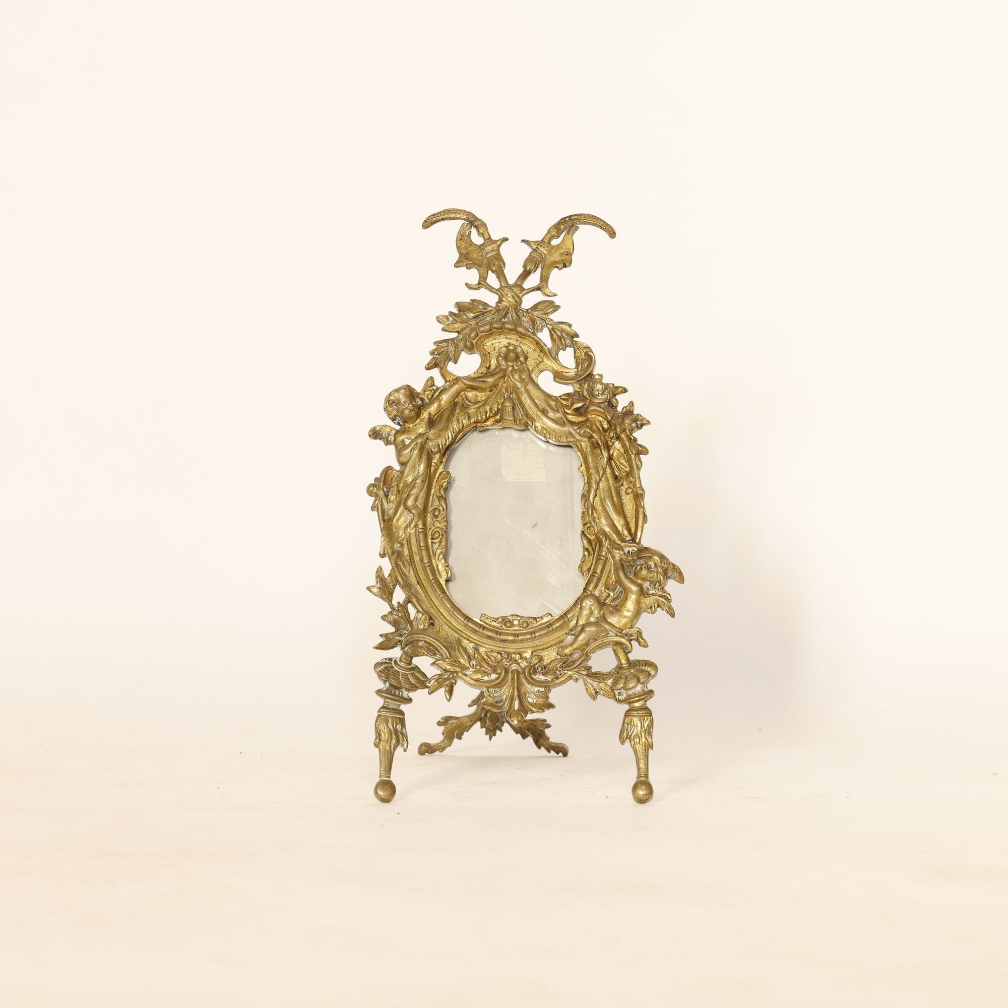 Decorative rococo mirror on a white background