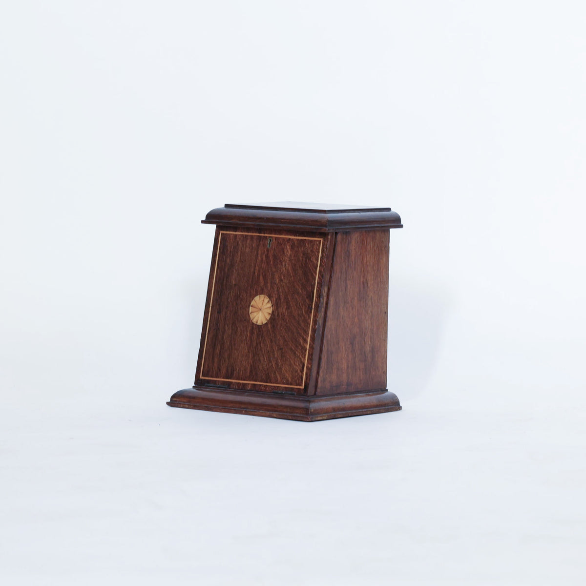 The Euro Trash Antique Inlaid Wooden Document Box is a compact, dark wood storage piece featuring a slanted front panel and an elegant inlaid floral design, ideal for decorative organization and photographed against a plain white background.