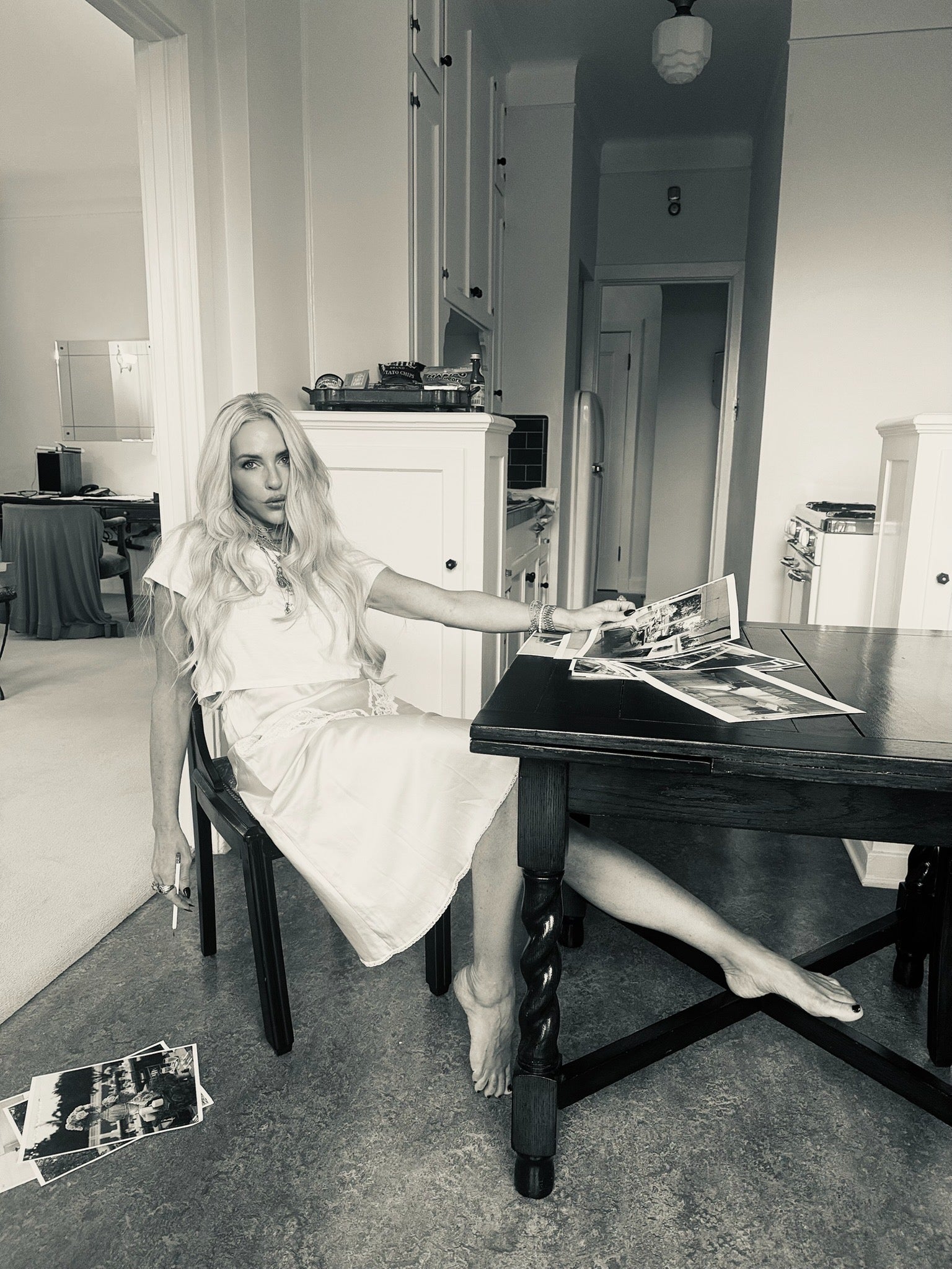 A woman sitting at a table.