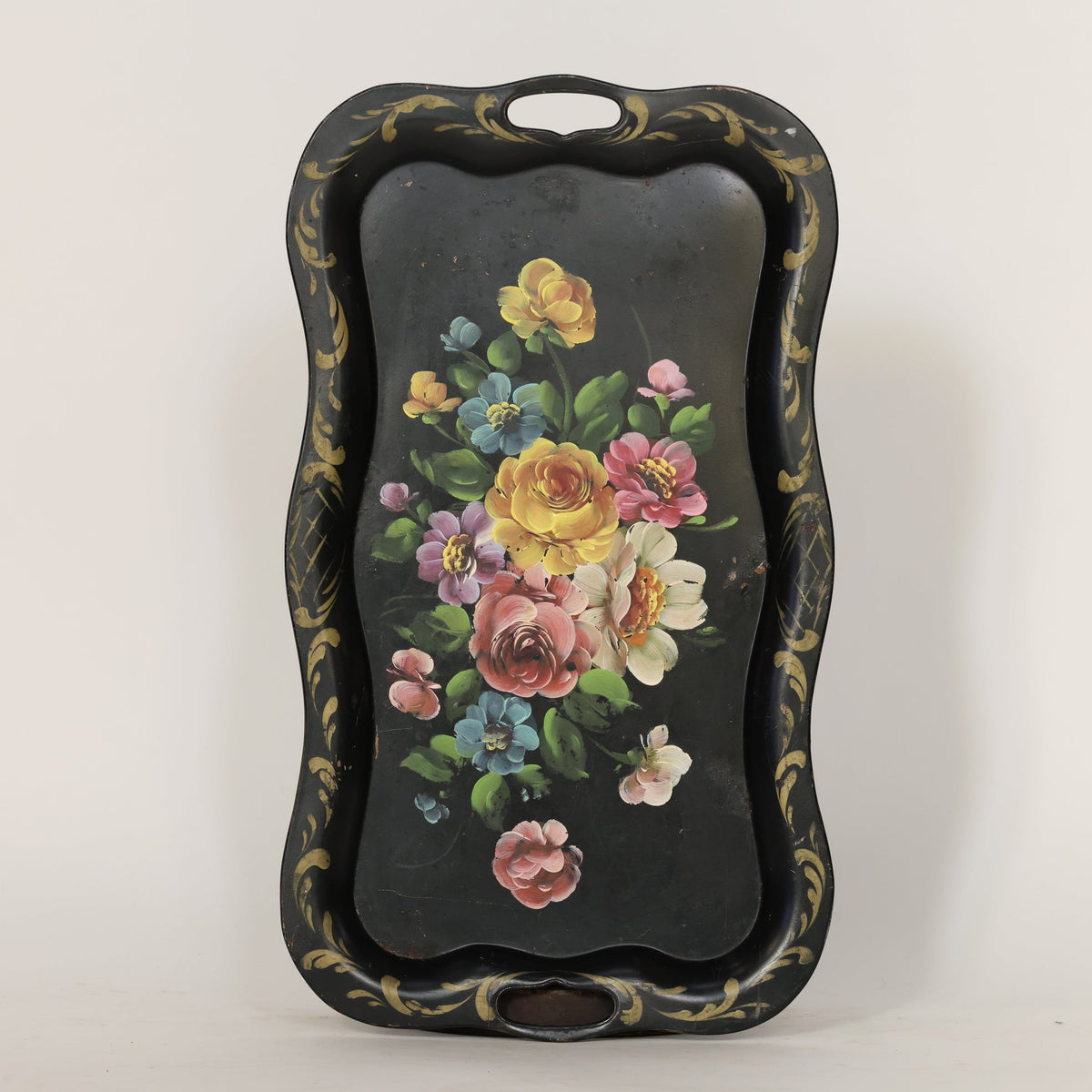 decorative tray with floral design on a white background.
