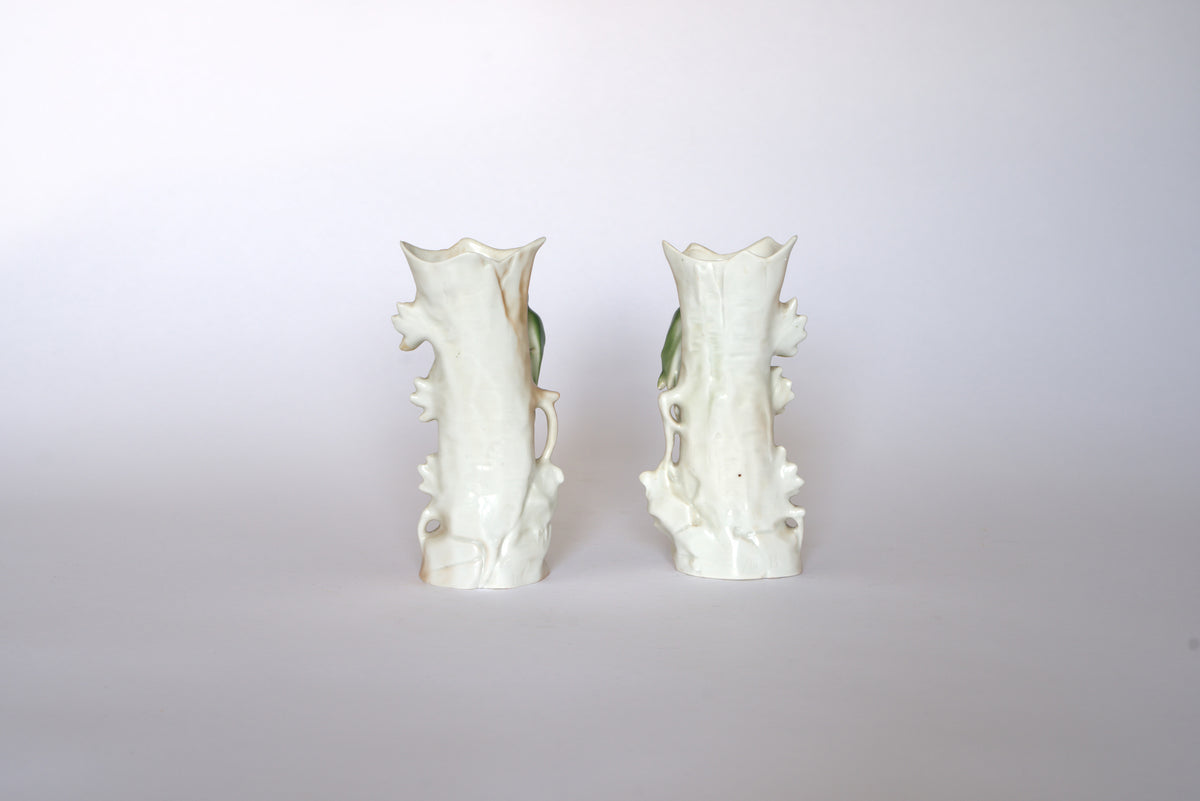 The Euro Trash Pair of Vintage Ceramic Hand-Painted Bird Vases stand side by side against a light background, showcasing their charming cottage aesthetic.