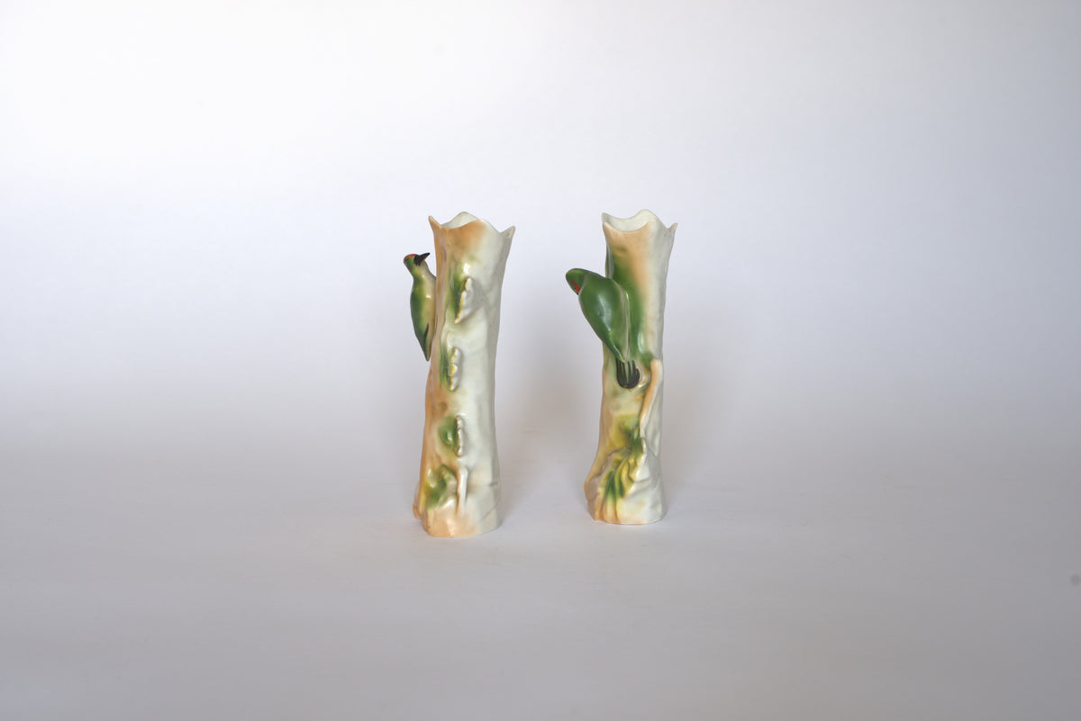 The Euro Trash Pair of Vintage Ceramic Hand-Painted Bird Vases stand side by side against a white background, bringing a charming cottage aesthetic to any space.