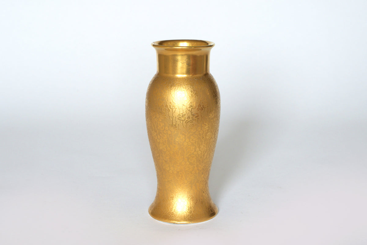 The Euro Trash Vintage Gold Etched Glass Vase features a tall design, flared rim, and subtle floral etching, showcased against a plain white background.