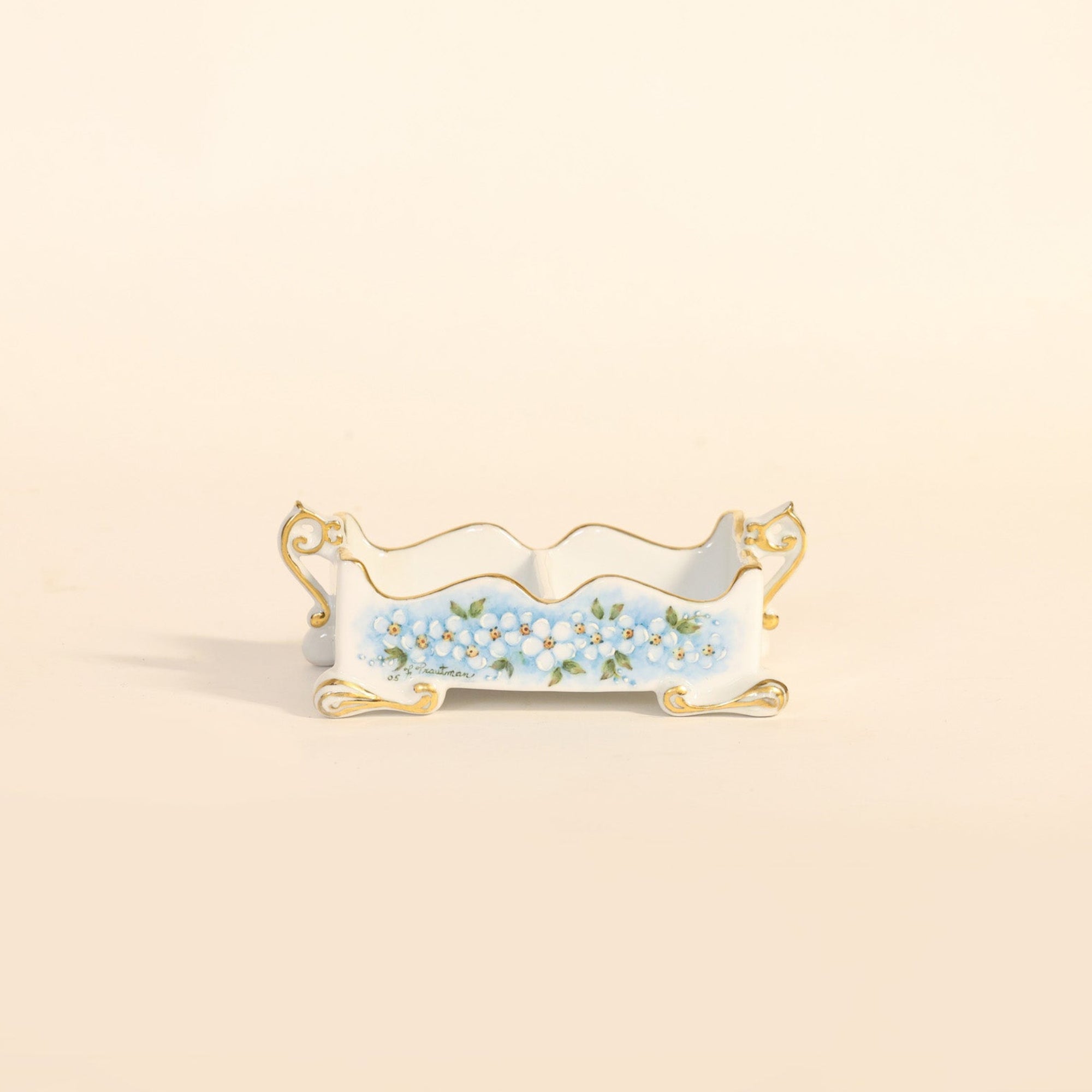 Decorative tray with floral design on a beige background